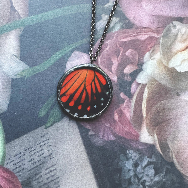 Red Flasher Butterfly Circle Pendant